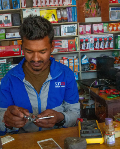 A man repairing a mobile 