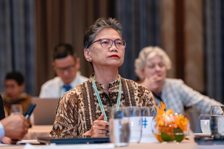 Myra Maria Hanartani,, Employers' Representative Woman sitting in a conference