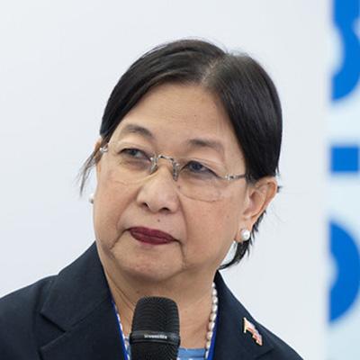 Woman looking at the camera on the left