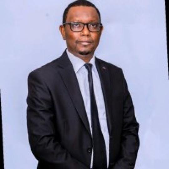 Man standing in front of a white backdrop