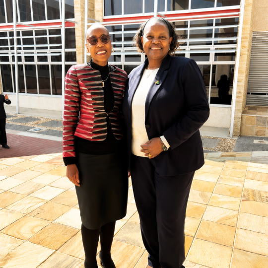 Two women standing together