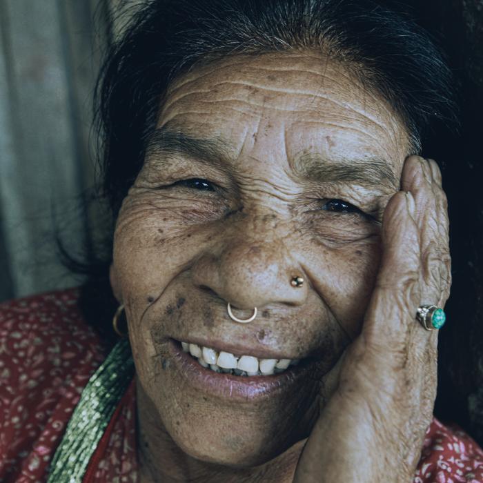 Close up photo of an elderly indigenous woman.