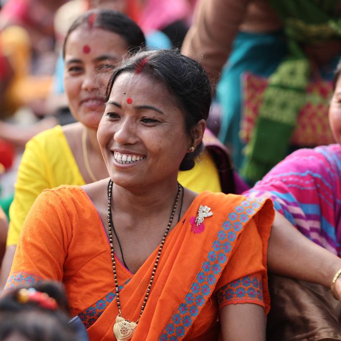 Smiling women in colourful traditional clothes