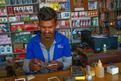 A man repairing a mobile 