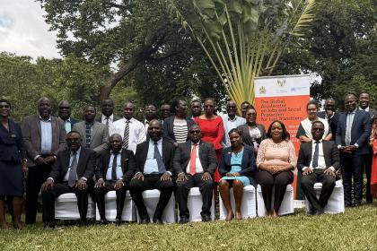 Group photo with men and women outdoors