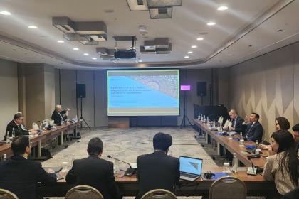 Women and men in a conference