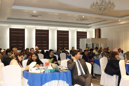 Women and men in a conference room