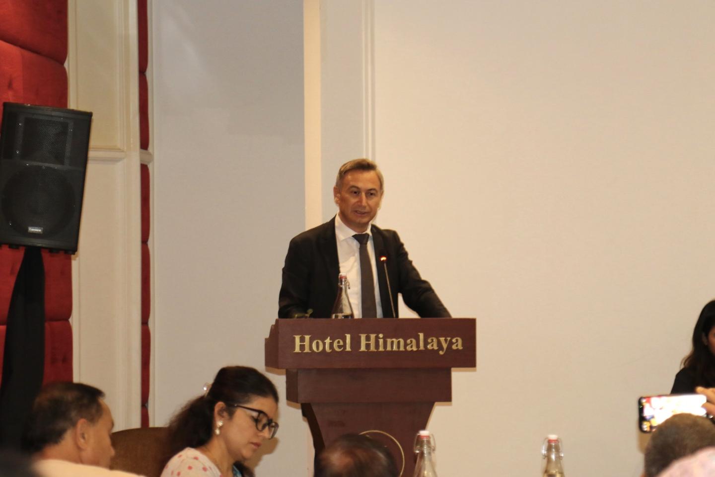 Man standing at a podium