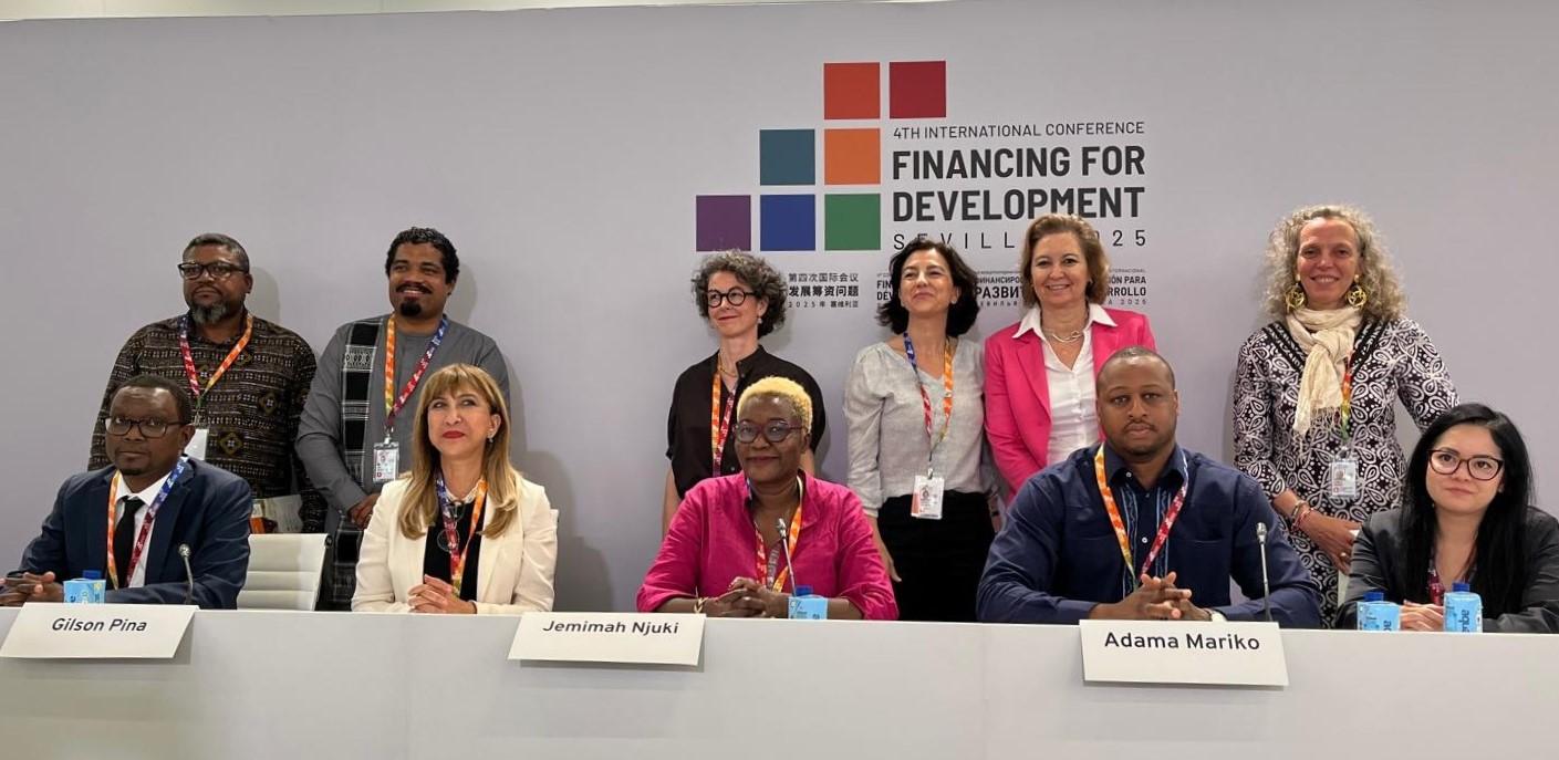 Women and men at a dais
