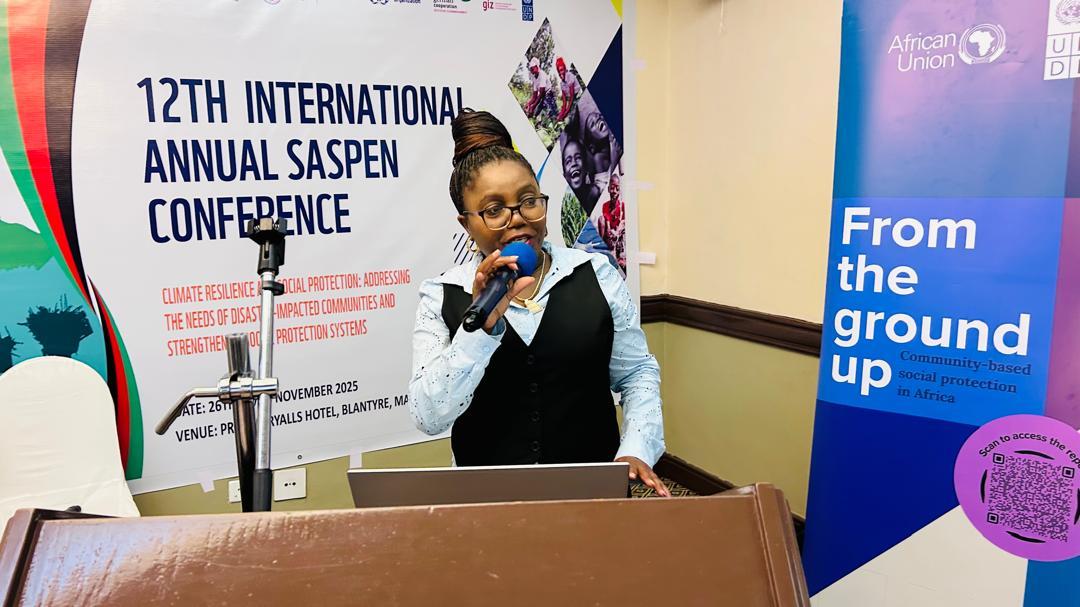 Woman speaking into a mic