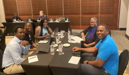 Women and men at a group discussion