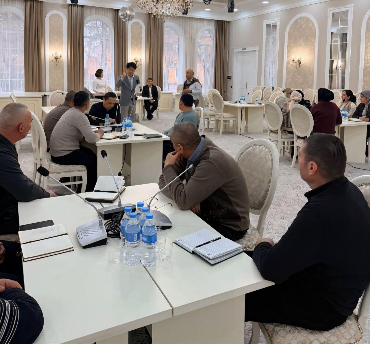 Women and men at a workshop