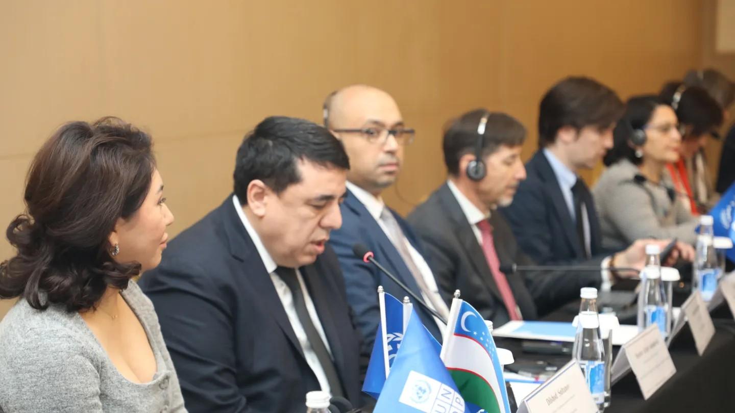 women and men in a meeting