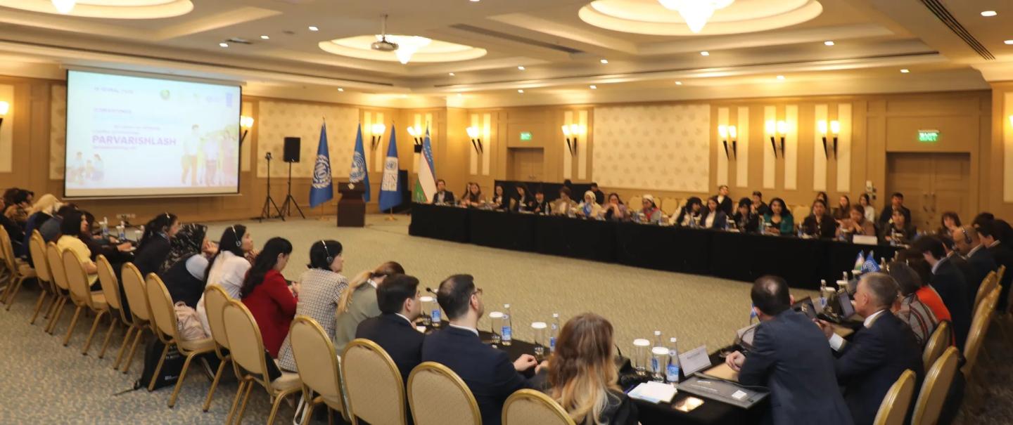 Wide shot of a big roundtable conference 