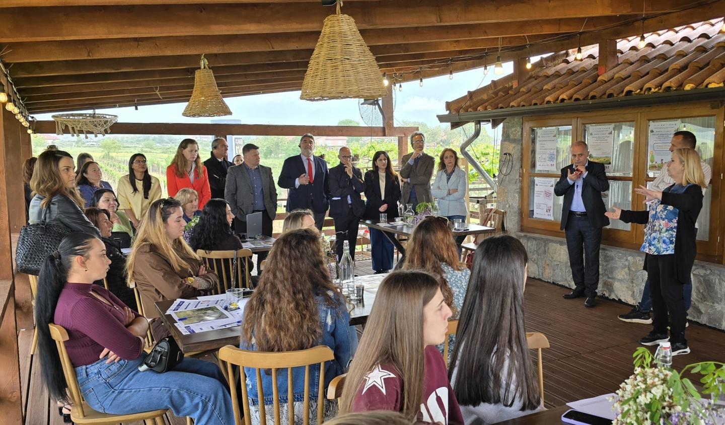 A group discussion in an outdoor setting