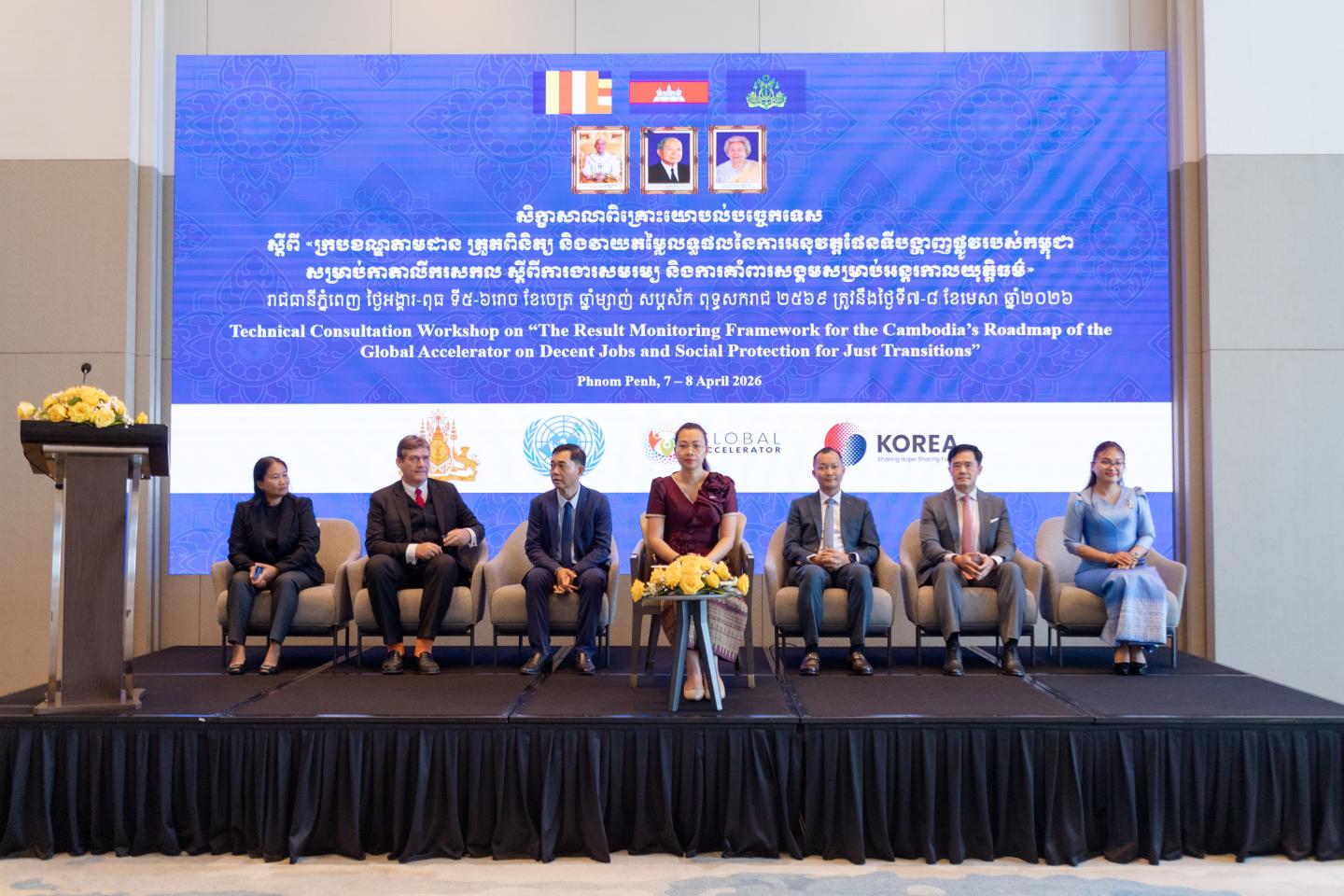 High-level panellists seated on the stage for the event