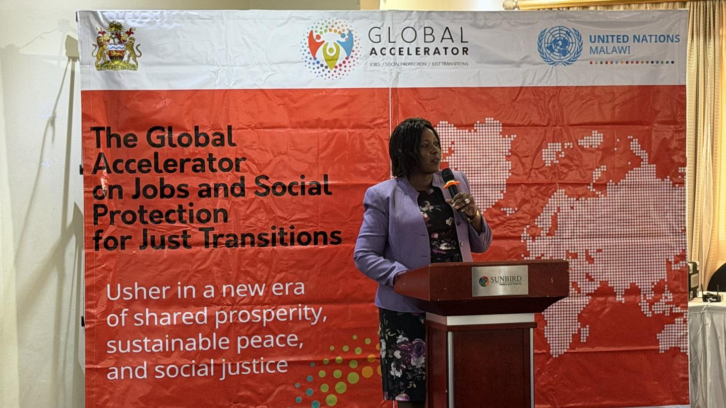 Woman speaking at a meeting