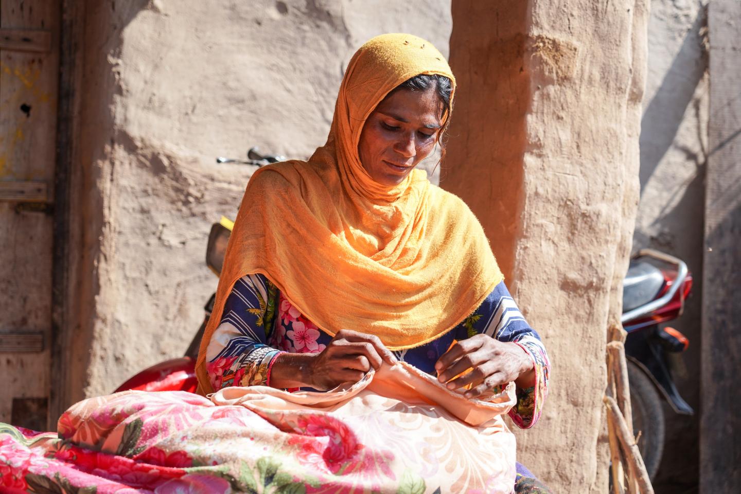 Woman working on embroidery 