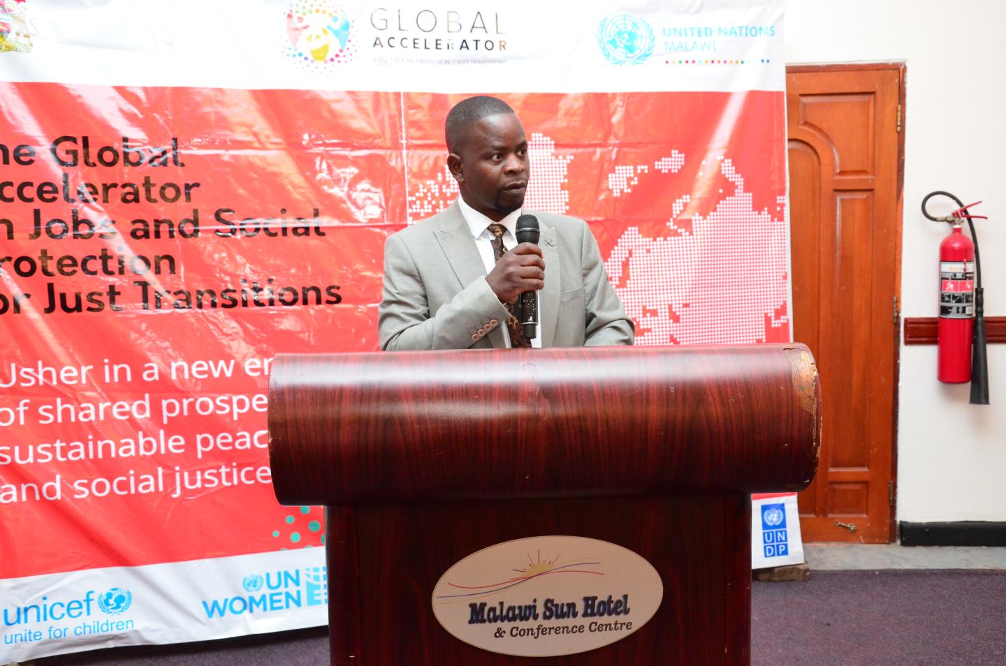 Man standing at a podium