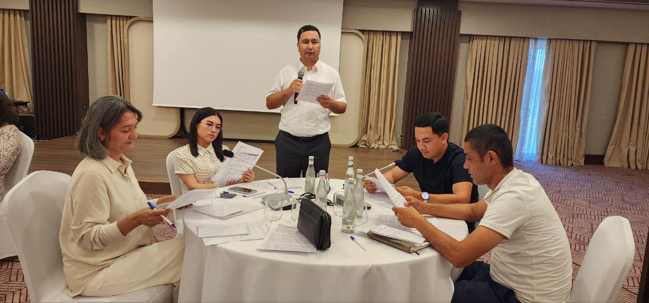 Man leading a group discussion