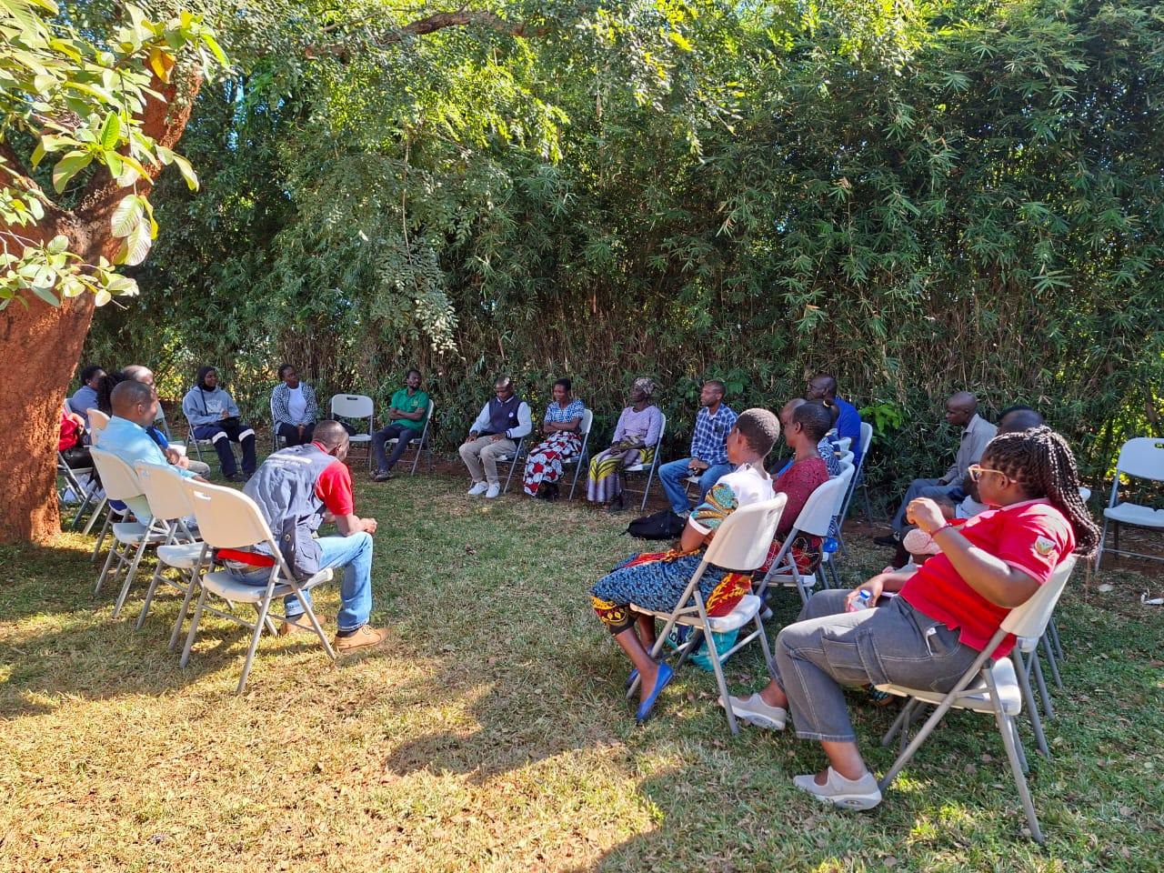Workers sitting outside for a discussion