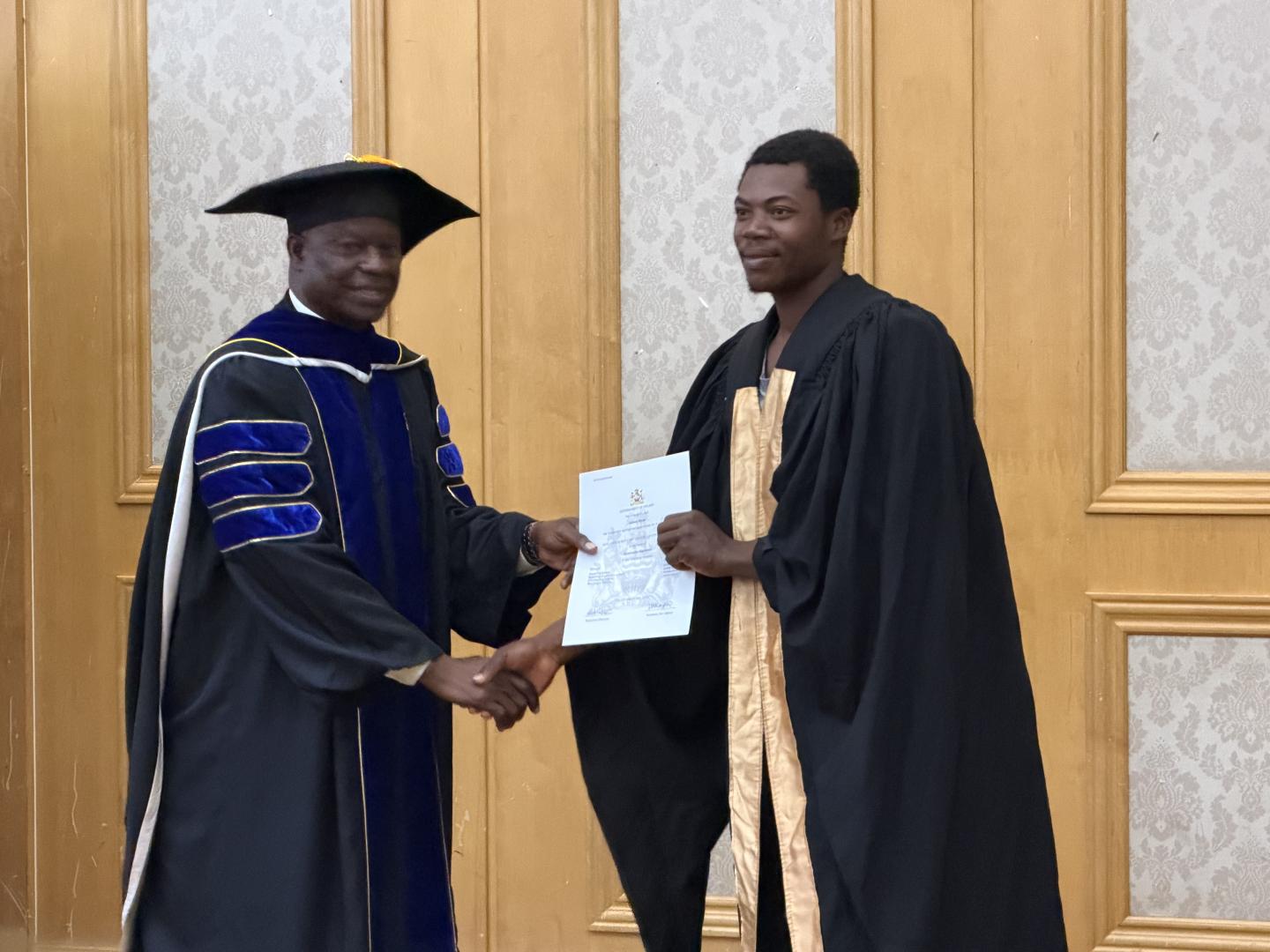 Man receiving a certificate