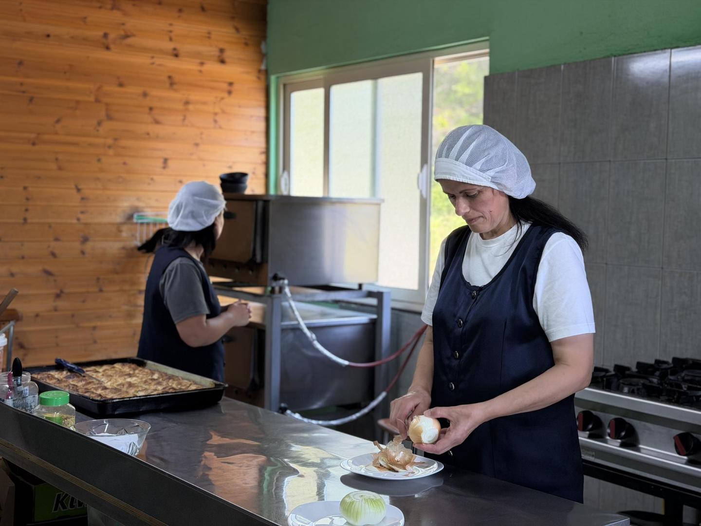 Woman working in a professional kitchen