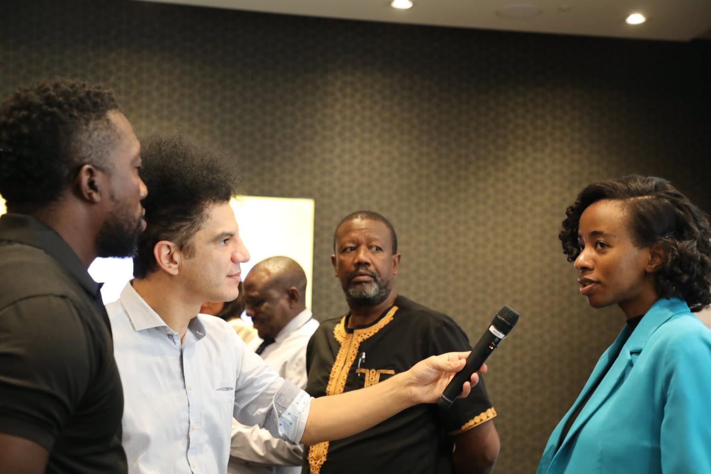Man interviewing a woman